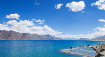 Pangong is a huge drainage, high altitude lake in Leh, Ladakh. Despite its high salt content, it freezes over completely in winter. The Tibetan Pangong Tso means ‘High grassland lake’, an apt description - Photo By Abhir00p