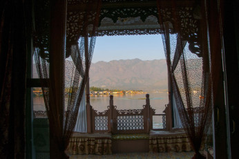 The scene across the balcony of a luxury houseboat on Lake Dal. Watching the rich birdlife from the verandah is a satisfying and sought-after experience - Photo By CRS PHOTO