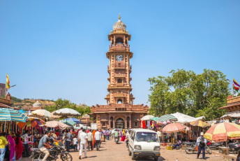 A crowded sight of Sardar Market and Ghanta Ghar Clock tower which is a popular landmark in the old city of Jodhpur, Rajasthan India. It is a part of the city’s history © Richie Chan