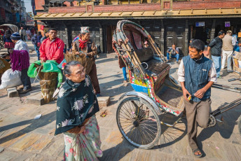 Thamel’s busy streets in the heart of Kathmandu are filled with rickshaw
drivers awaiting customers and vendors of all kinds. The men in the picture
sell handmade brooms. © fotoVoyager
