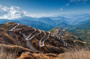 A beautiful spiral network of three Level Zigzag Road located in Sikkim. It has more than hundred hairpin bends and is very challenging even for pro bikers and drivers, Sikkim, India. © Rudra Narayan Mitra
