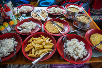 A spread of dishes ready for hungry trekkers. Although the food served in lodges in the Himalayas are basic in nature, the dishes are always substantial and tasty © MosayMay