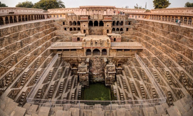 The Chand Baori Stepwell in the village of Abhaneri, Rajasthan, is 1000 years old. © Amith Nag / Shutterstock