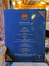 Breakfast menu having all the healthy items starting from fruits to beverages on the Golden Chariot Luxury Train © Mar