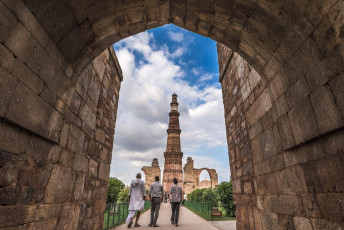 A beautiful view of the 12th century Qutub Minar Tower which is an architectural masterpiece and boasts of being the world’s tallest brick tower situated in New Delhi, India © Kanisorn Pringthongfoo