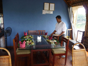 Lunch being served for guests visiting the houseboat on Kerala’s backwaters where they can enjoy their meal floating across waters, admiring the flora around.