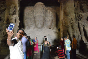 Tourists in ancient Elephanta Caves, Elephanta Island, Mumbai