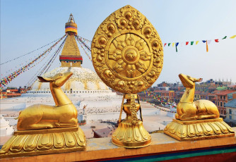 A grand view of the Golden Brahma symbol situated just in front of the BoudhaNath stupa known for its massive mandala which makes it one of the largest spherical stupas in Kathmandu, Nepal © Hamsterman