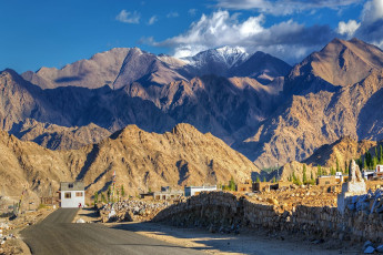 A spectacular view of Leh Highway with rock-strewn Mountains and snow-capped peaks, while blue skies in the backdrop add up to its beauty at Leh-Ladakh, Jammu and Kashmir, India © Rudra Narayan Mitra