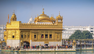 A striking view of Amritsar’s Golden Temple glimmering in the sun, Punjab © Saisnaps