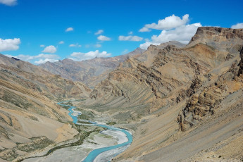 A clear blue narrow rivulet along the Leh Manali Strait, passing through the Himalayan landscapes, Leh Ladakh, India © Roberto Caucino