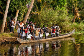 Just another day for school children as they take a boat ride through the backwaters of Alappuzha, to get home. © cornfield.