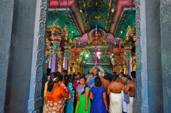 Worshippers fill the entrance to Naga Pooshani Ambal Kovil, a Hindu temple built according to Dravidian architecture, located on Nainativu Island amidst the Palk Strait. The temple has been mentioned in Tamil literature since antiquity © Denis Costille