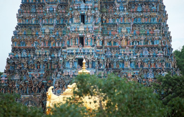 A scenic view of Gopuram, a monumental entrance tower from Meenakshi Temple situated at Madurai. © Robas