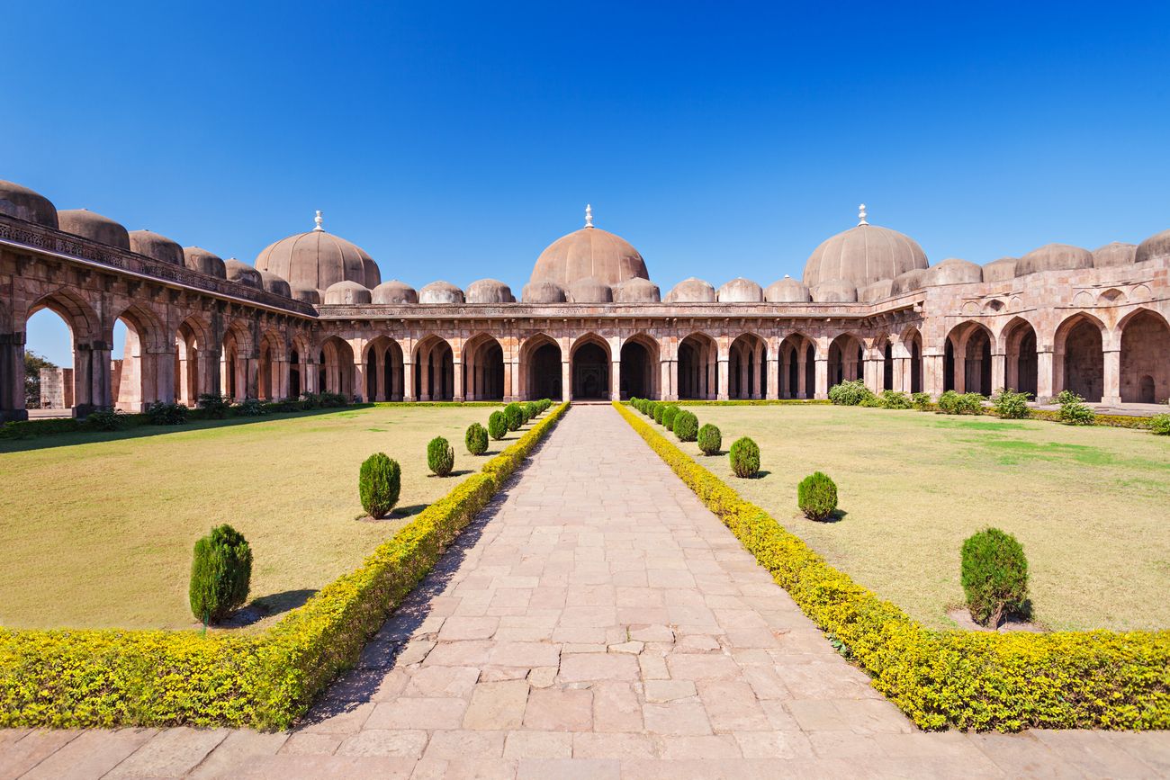 The exterior of the Jami Masjid prayer hall. These elegant arcades and domes lend a lyrical symmetry to Jami Masjid, Mandu