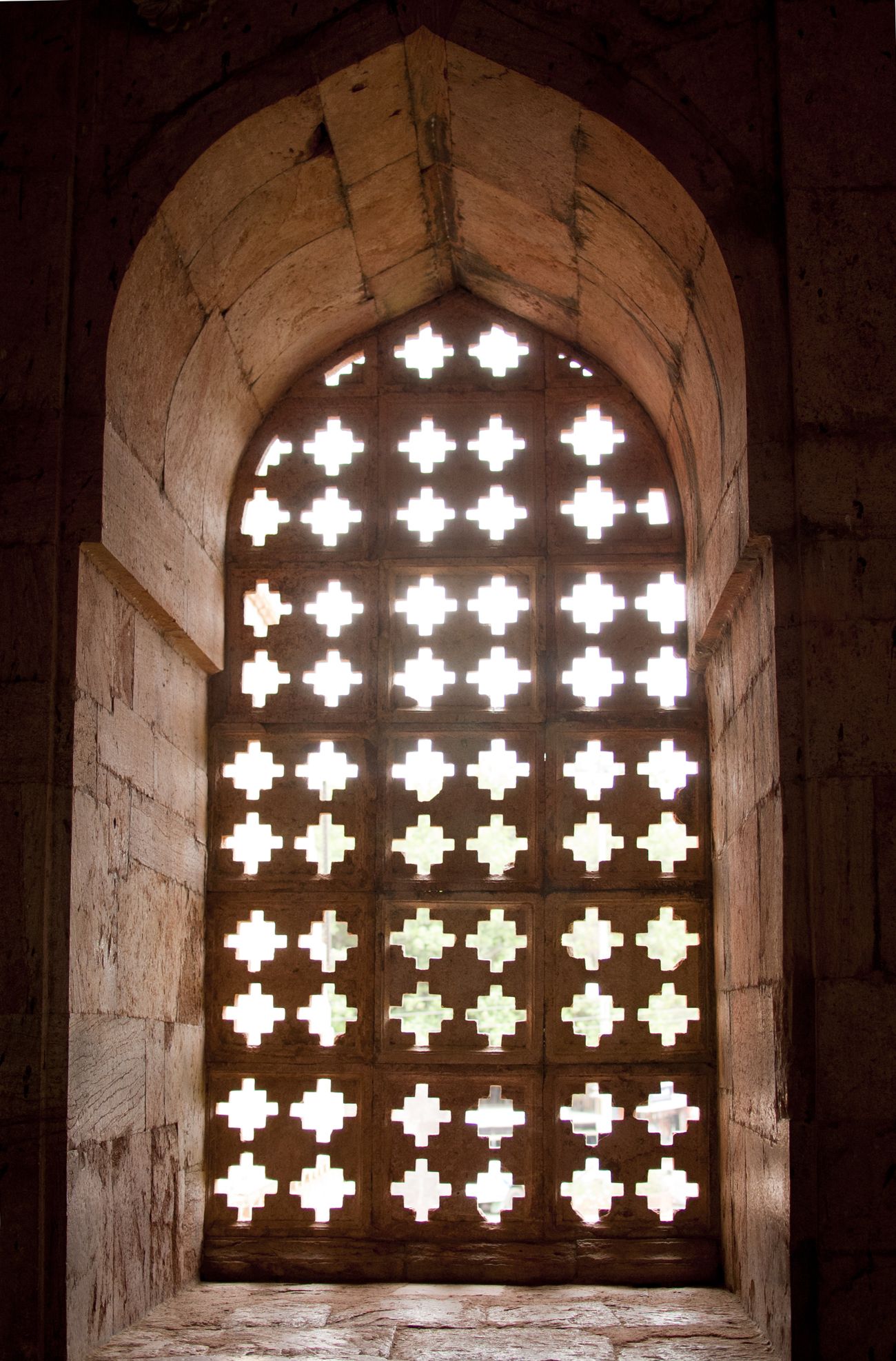 Intricate stone jaalis are occasionally used to striking effect, Mandu