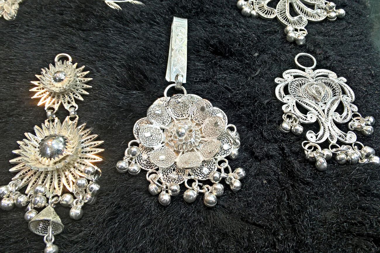 The final products of the laborious Silver Filigree Work in Cuttack - earrings, pendants, ODISHA