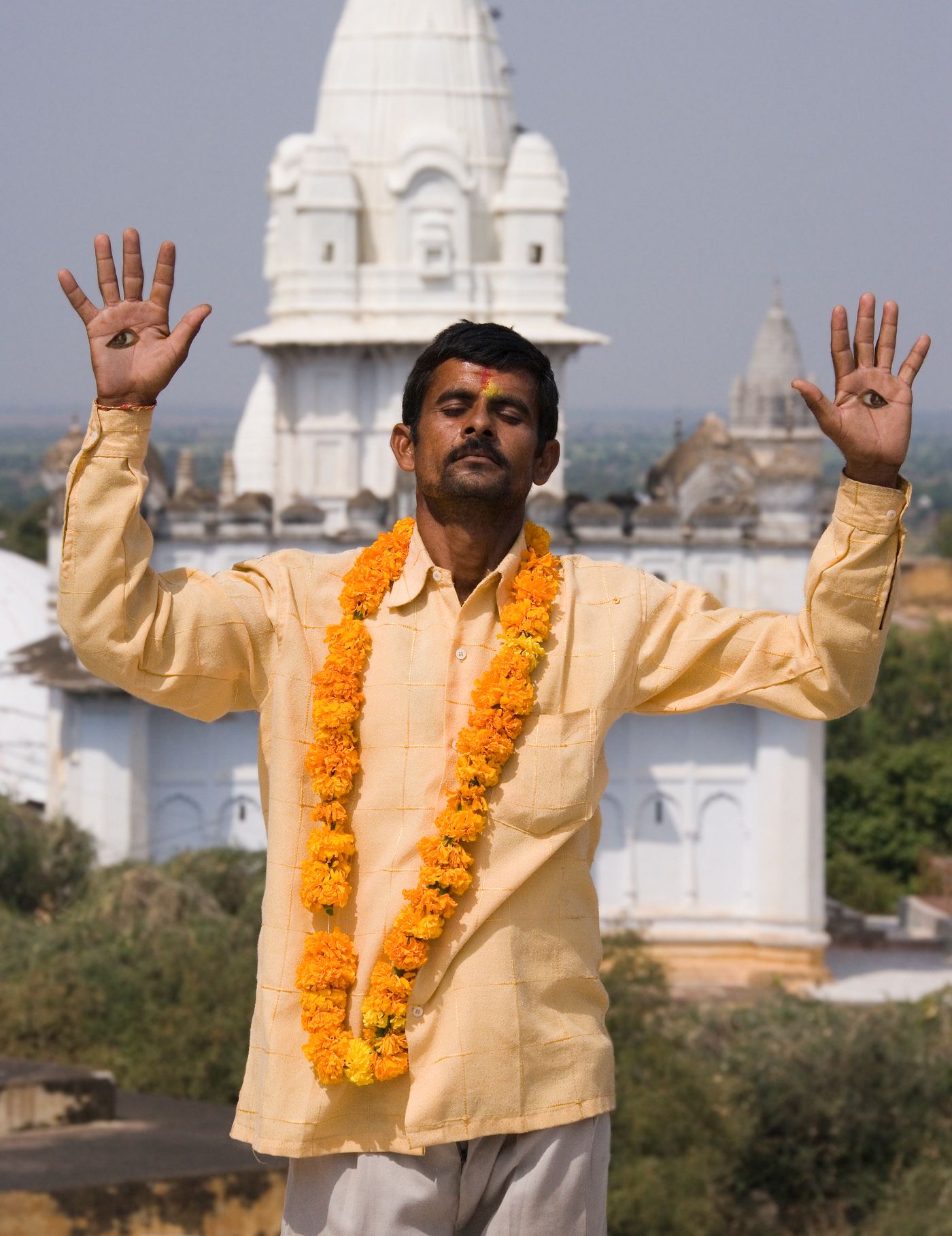 A pilgrim at the complex of 77 Jain Temples. These are located at Sonagiri in the Budelkhand area of Madhya Pradesh