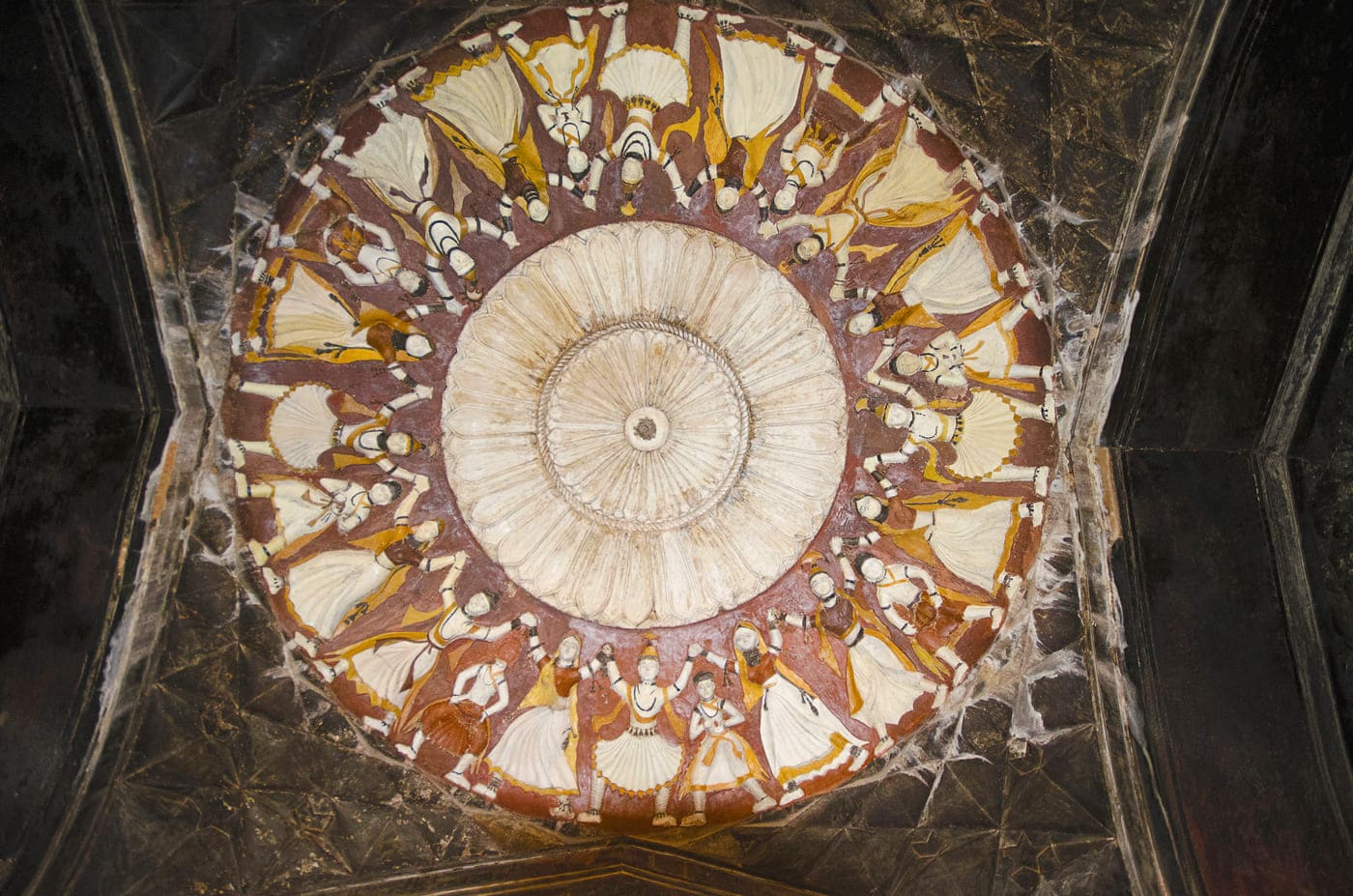 An ancient painting on the ceiling of the Datia Palace, inspired by Sufi traditions and customs which enamoured the Mughal kings, Madhya Pradesh