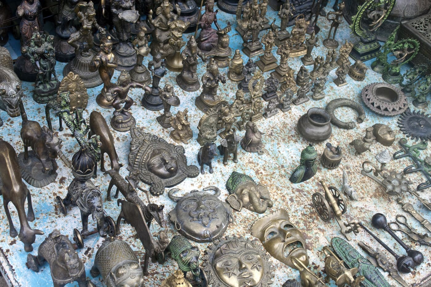 Bronze sculptures and figurines for sale in a village market in Orchha
