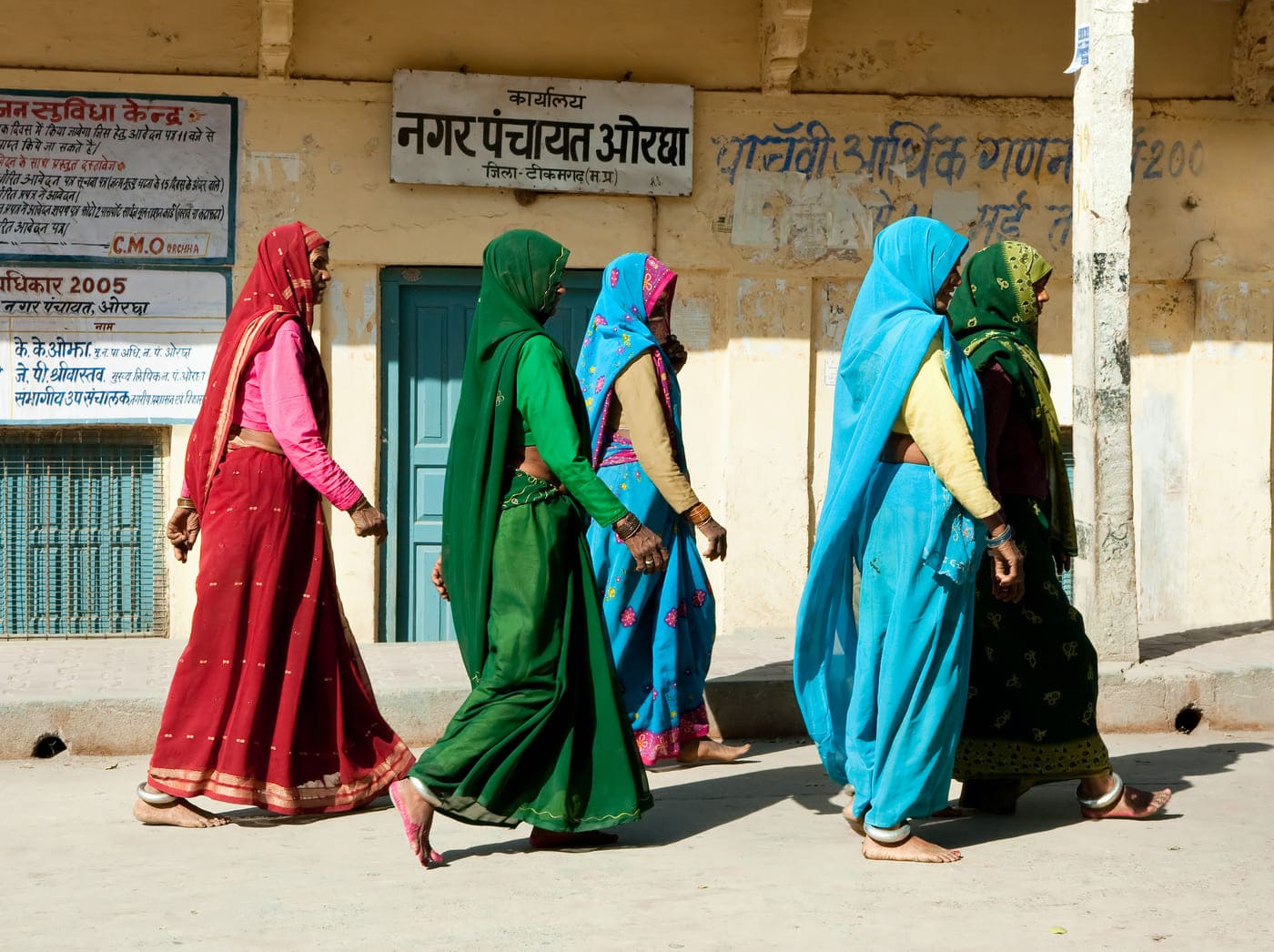 Indian women dressed in beautiful saris in Orchha town