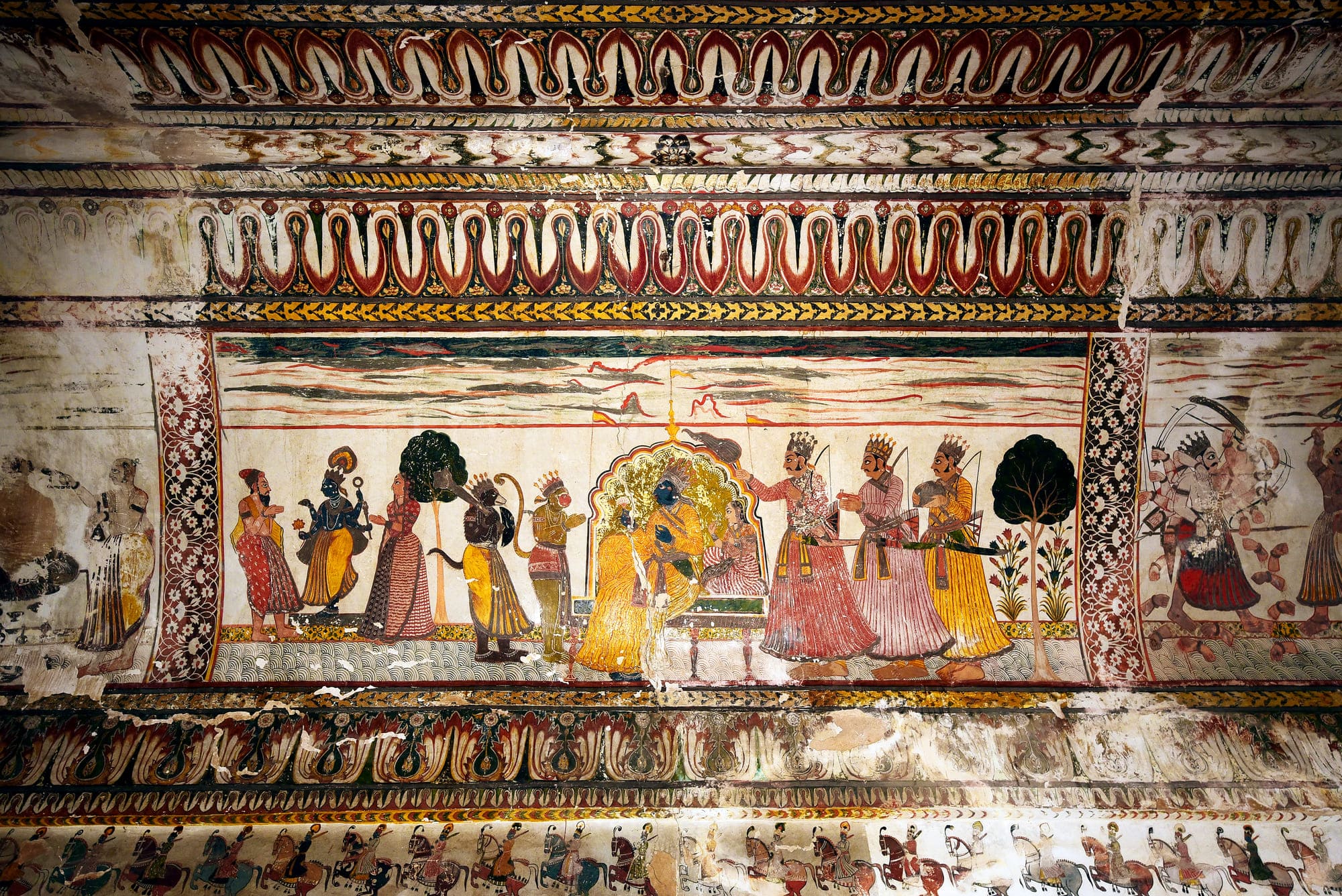 Lord Rama, one of the 10 reincarnations of God Vishnu, sitting on a throne in a royal posture with his wife Sita, accompanied by their advisers Hanuman (Monkey God) and Jambawan (King of Bears), Orchha