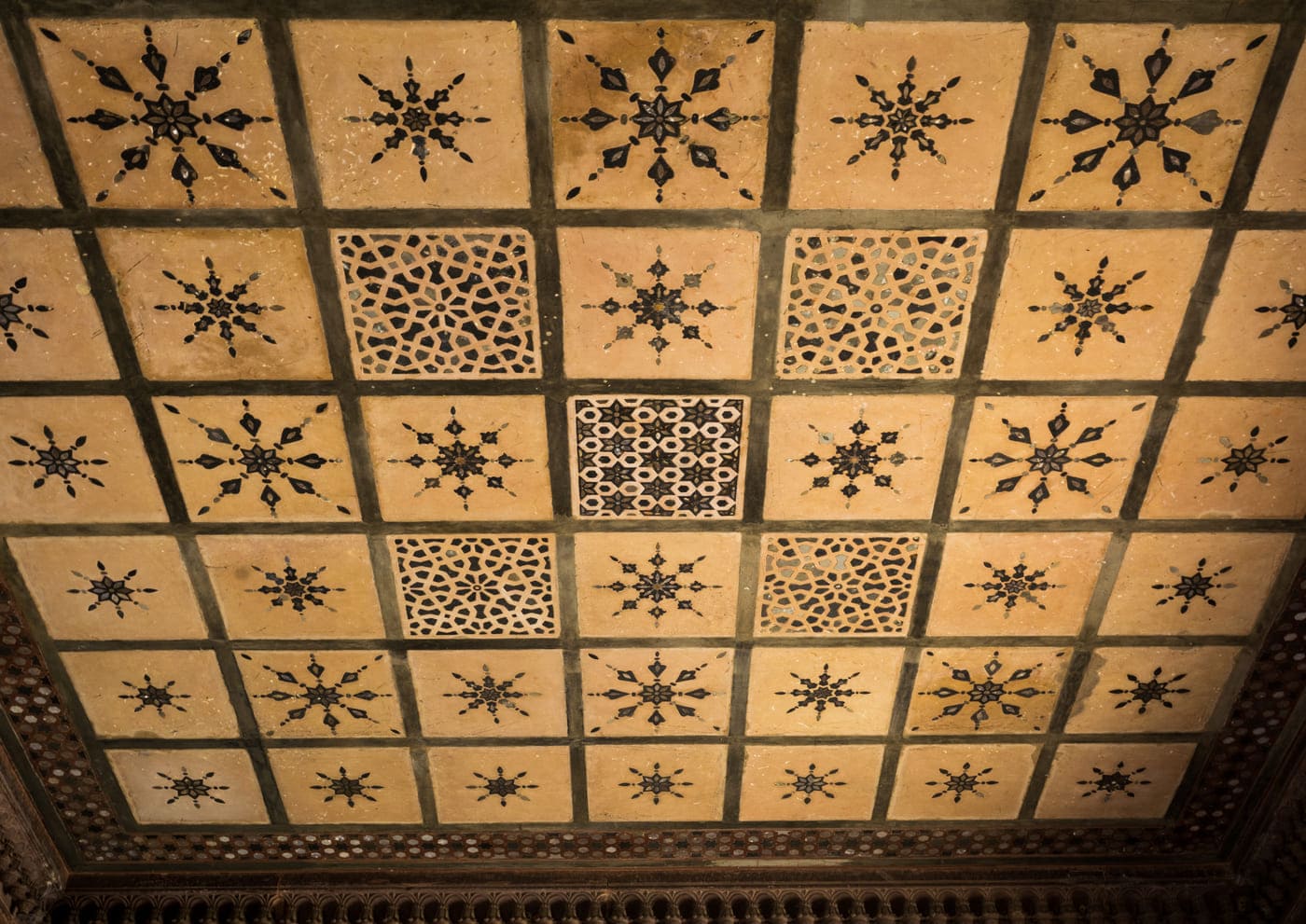 The ceiling of Datia Palace displays glorious artwork, intricate murals and design, Madhya Pradesh