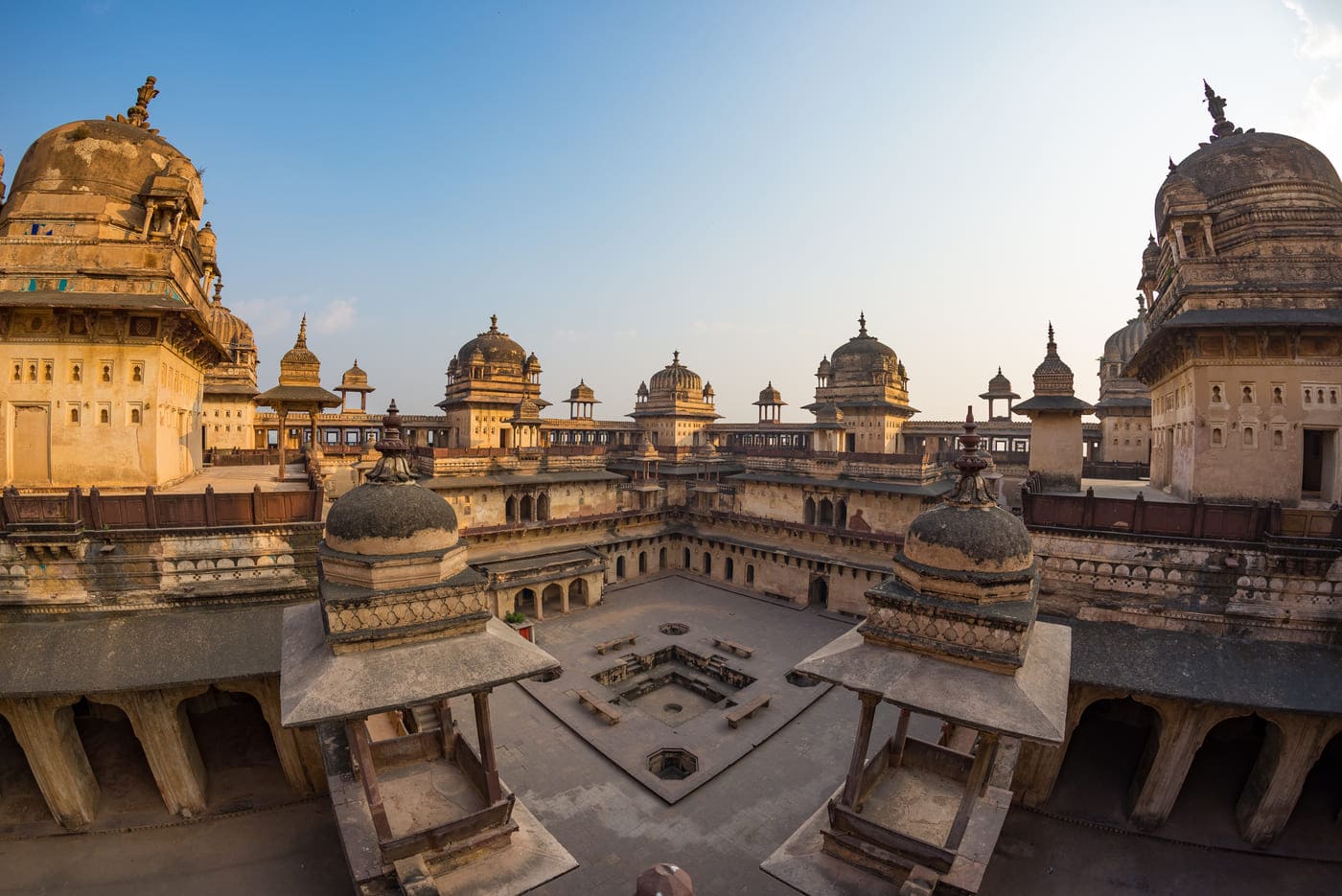 The magnificent Jahangir Mahal with its stone carvings, domes, turrets and central courtyard, Orchha 