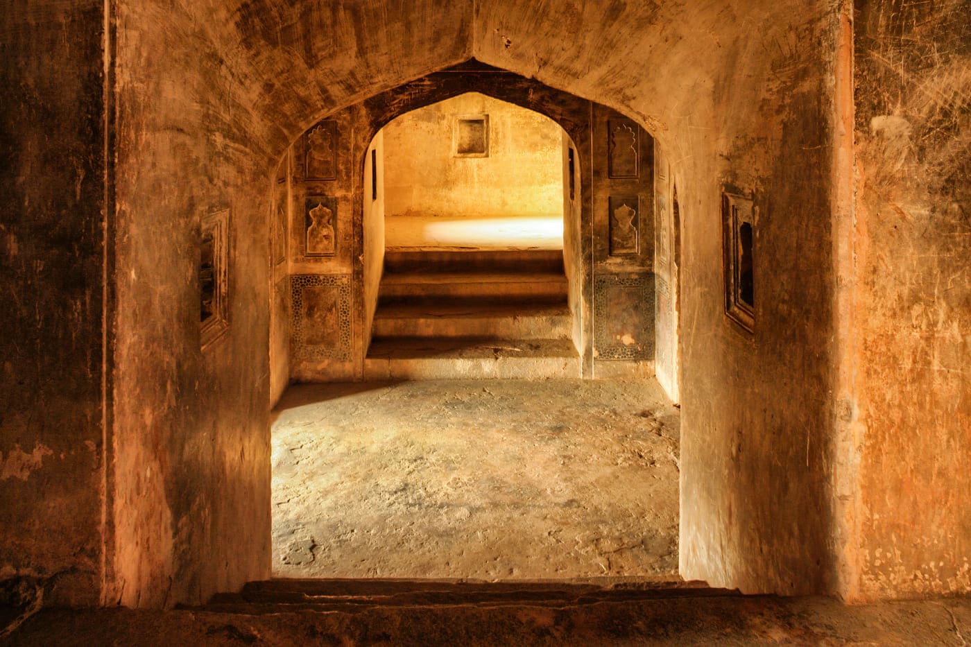 The shot of a passageway within the Datia Palace lit by daylight, the same as they were when constructed by the ruler of Datia in the seventeenth century, Madhya Pradesh 