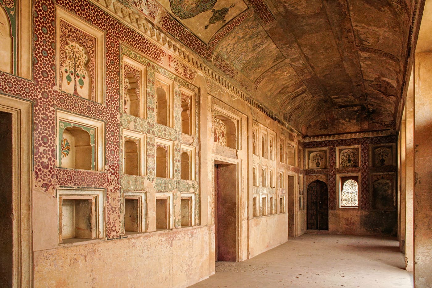 While some spots have given into the trap of time, the walls still tell a tale of royalty with exceptional decoration work which was carried out by local artisans at the time of construction, Madhya Pradesh 