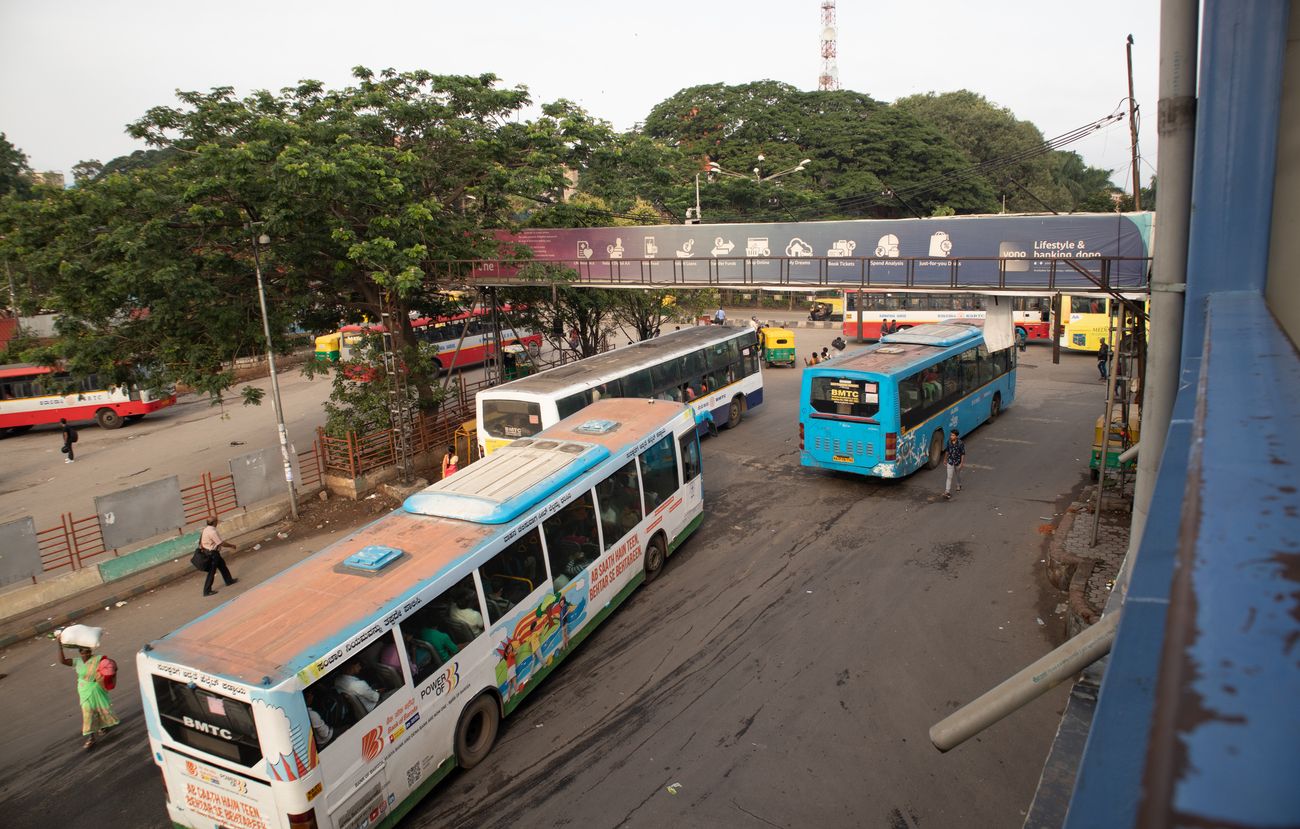 A crowd of buses in the Kempegowda Bus Station, more commonly known as Majestic Bus Station as it is a large bus station with congested traffic in central Bangalore 