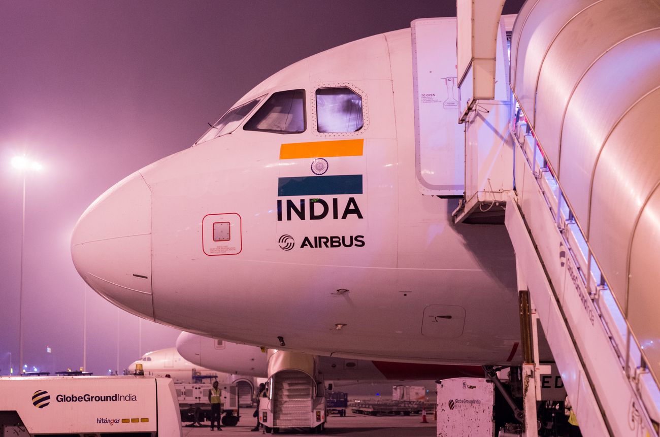 A flight boarding the passengers at Kempegowda International Airport. It is the third busiest airport by passenger traffic in India