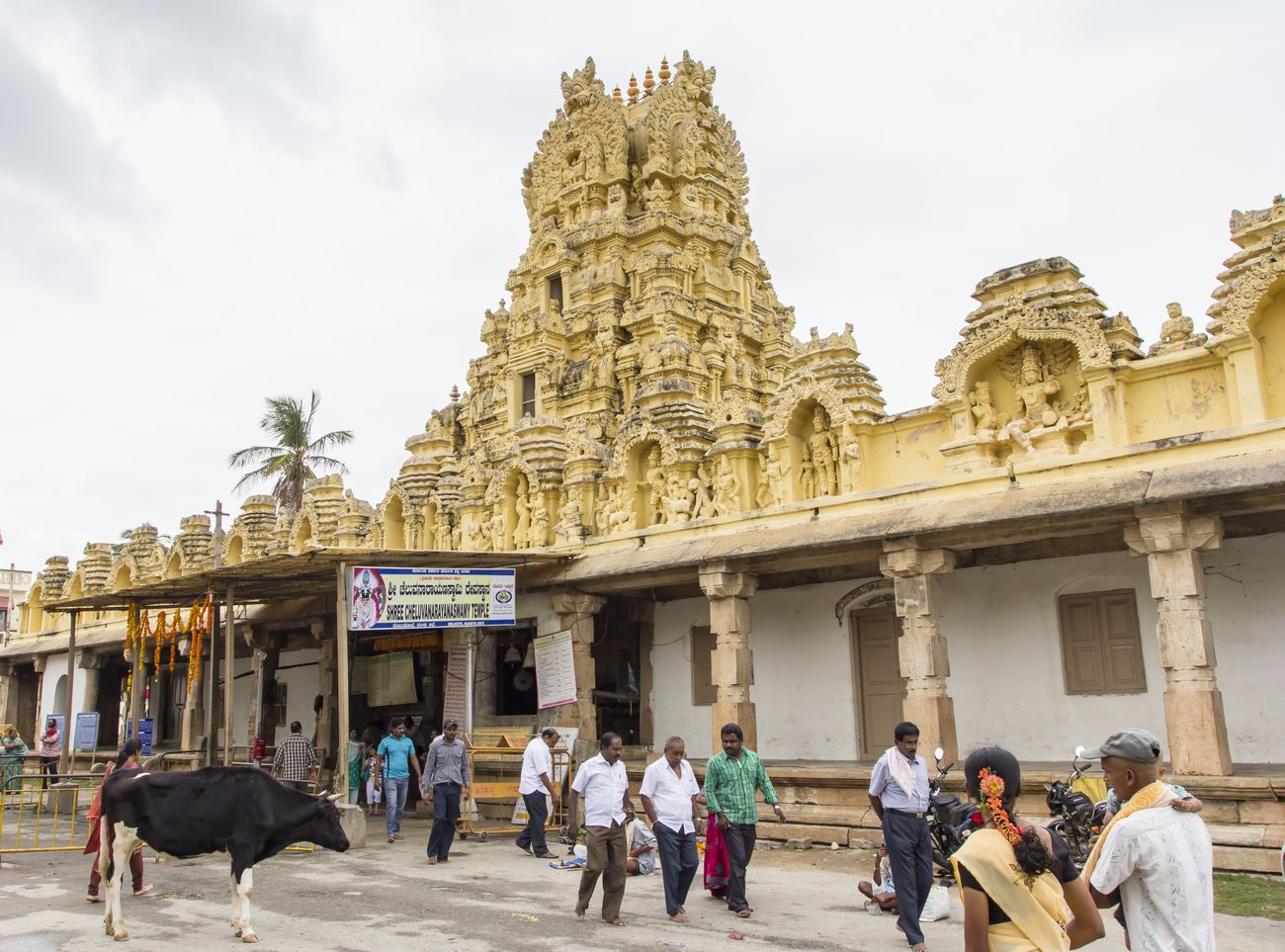 A number of worshippers outside the Cheluvanarayana Swamy temple at Melkote in the state of Karnataka. It is a beautiful temple with magnificently carved pillars and is said to be more than 1,000 years old