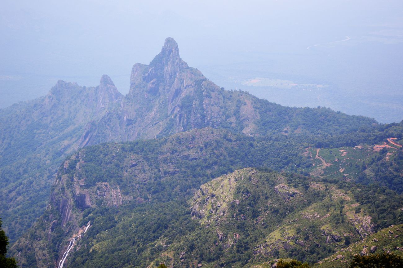 A mesmerizing and picturesque landscape of Kodanad viewpoint, Kotagiri, Tamil Nadu, India. The Moyar and Thengumarada Rivers are visible from this point and this place could be covered with mist but it gets cleared in a matter of 10 minutes 