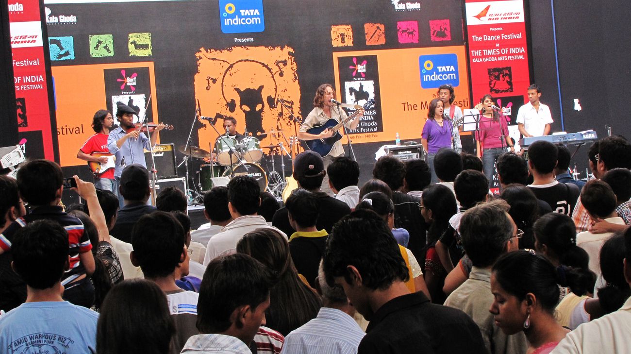 A Rock band performs at the Kala Ghoda Arts Festival 2010 to which the audience enjoys and has fun