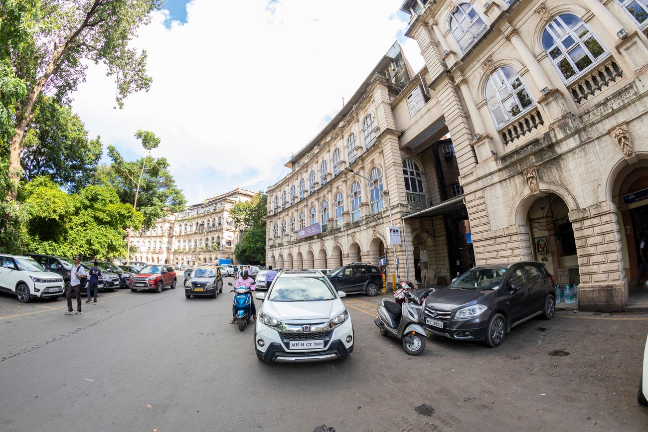 A sight of old building in Harniman circle situated at Kala Ghoda Arts Festival with vehicles parked outside in South Mumbai 