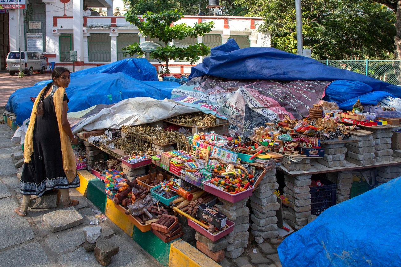 A souvenir seller at the Nandi Temple, Dodda Basavana Gudi, situated within Bugle Rock Park, in Bangalore 