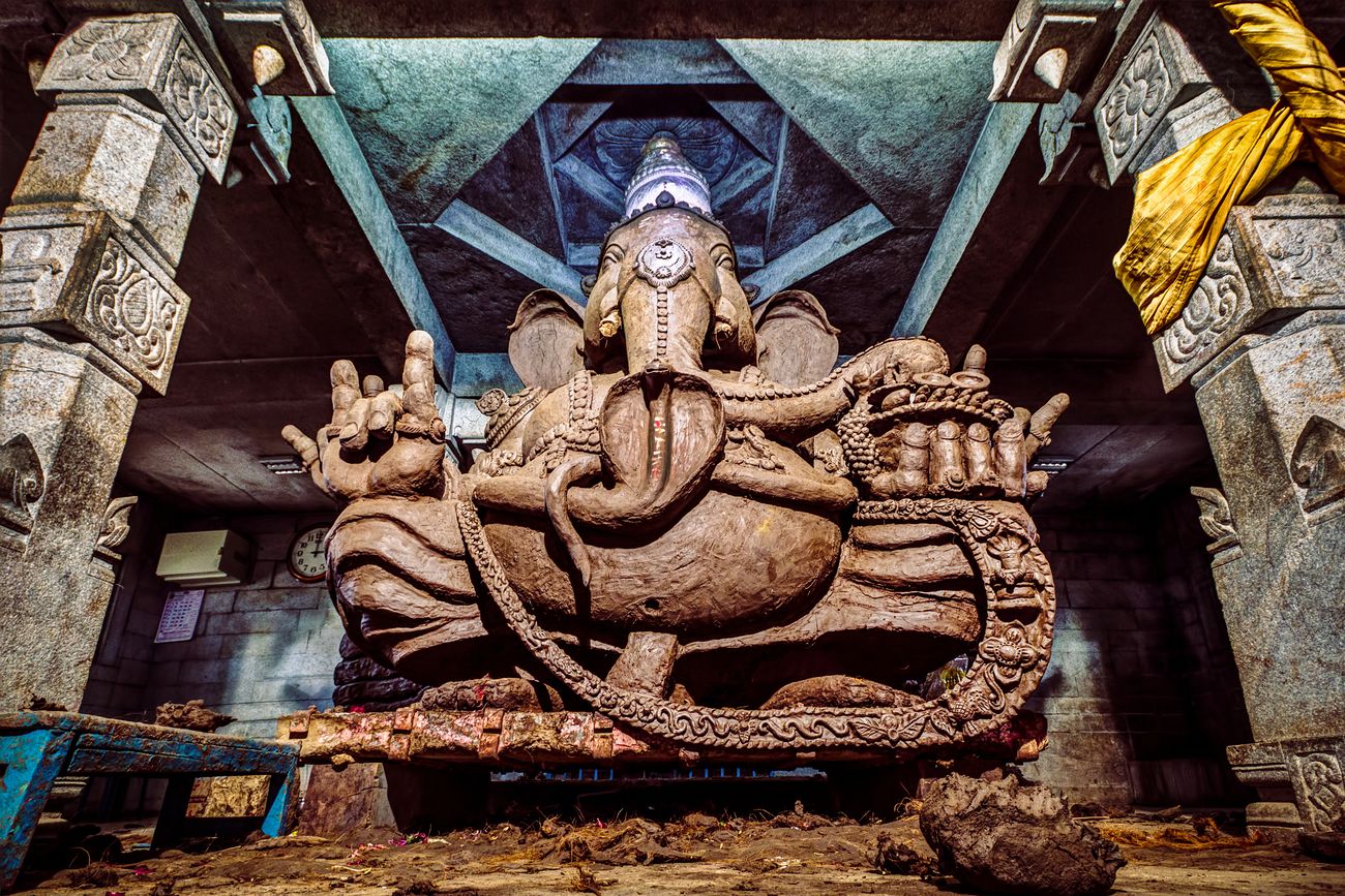 A twelve-foot gigantic hand-made clay idol of the Hindu God, Ganesha situated at a temple near Bangalore 