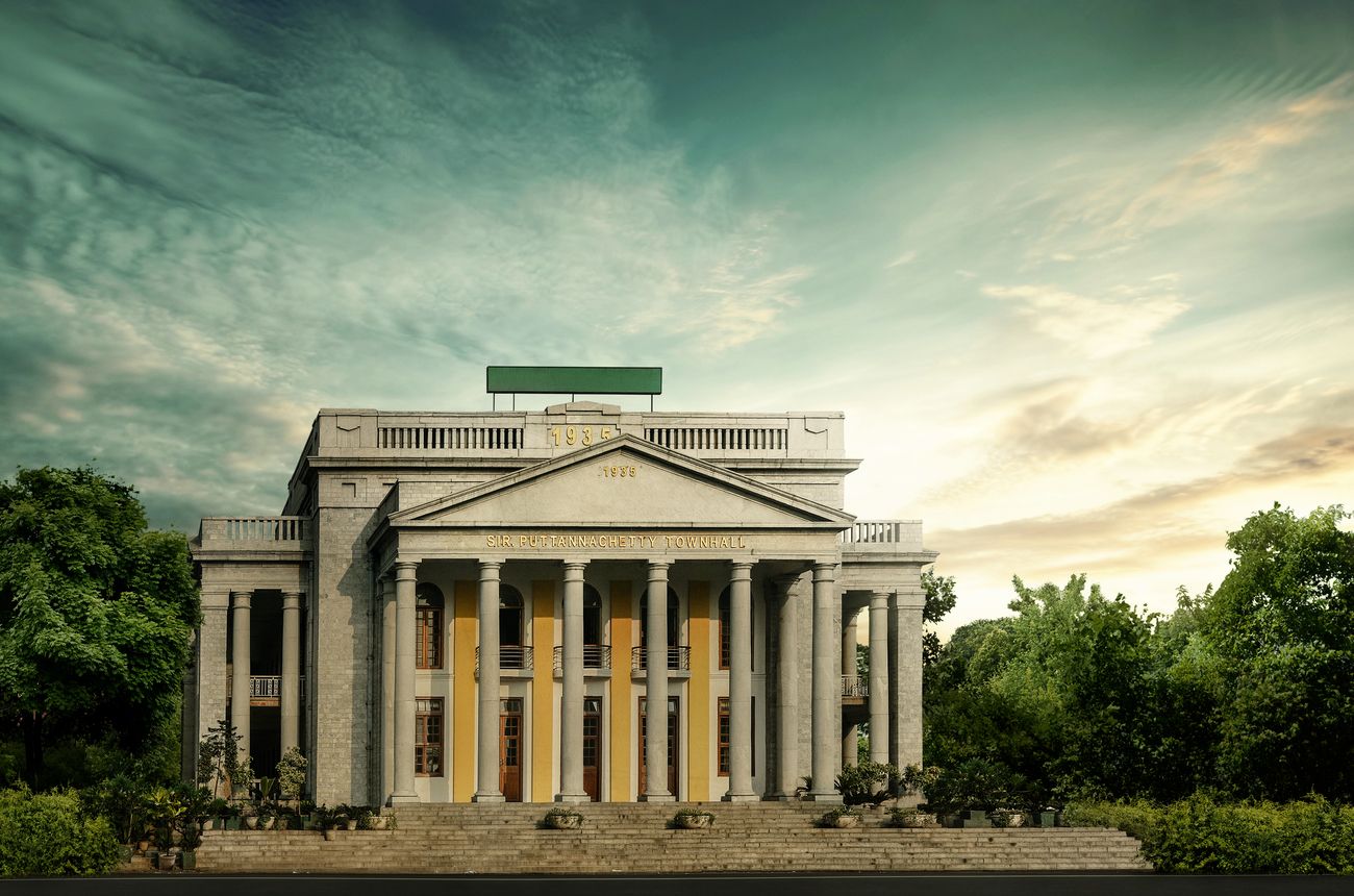 A mesmerizing view of Sir Puttanna Chetty Town Hall covered under the clouds in Bangalore. It is a grand stone structure that has been able to hold on to its identity even in today’s age of skyscrapers and modern buildings