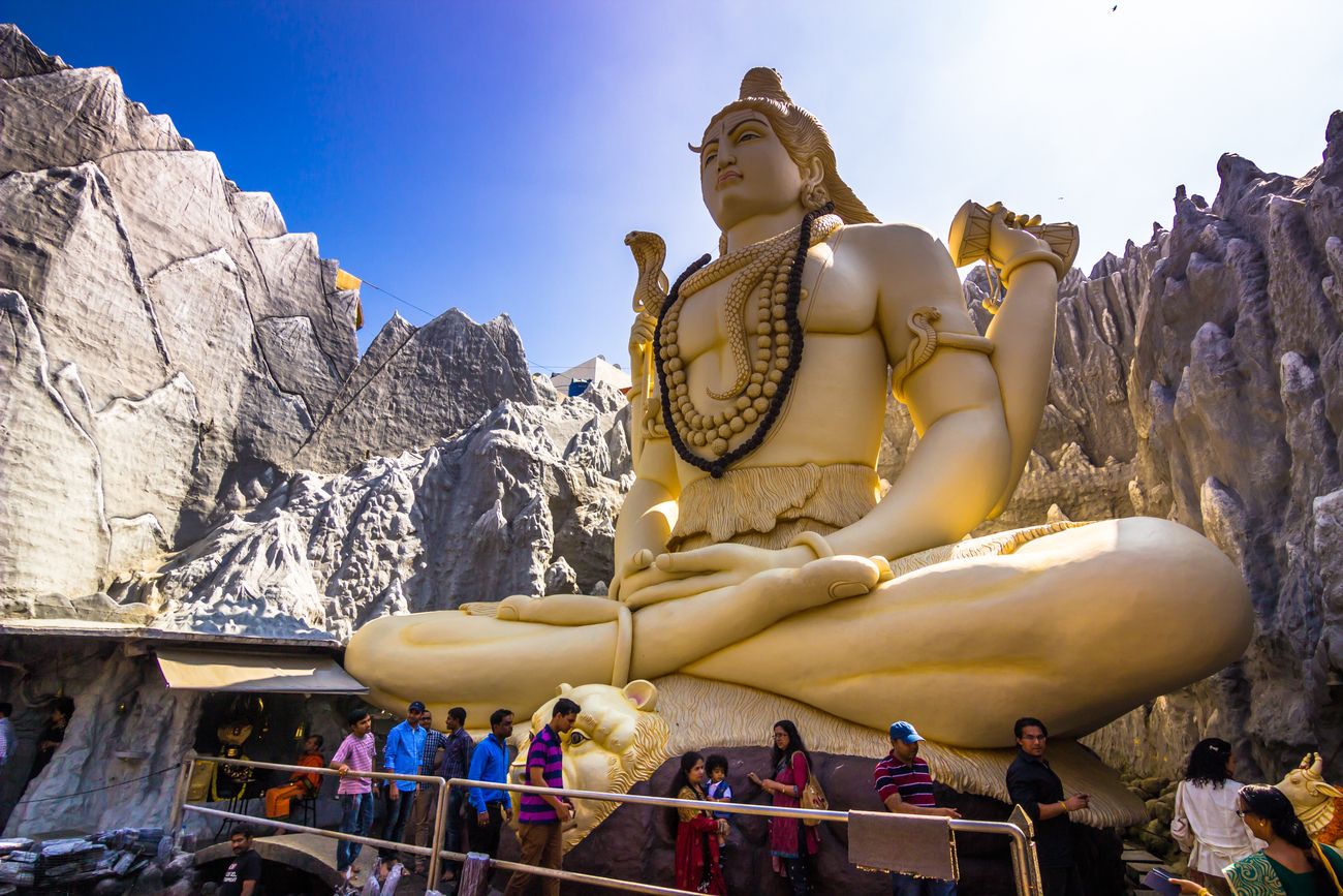 A zoomed in view of a gigantic statue of Lord Shiva in Kempfort Shiva Temple which is known for the 65ft Shiva Statue, situated in Bangalore
