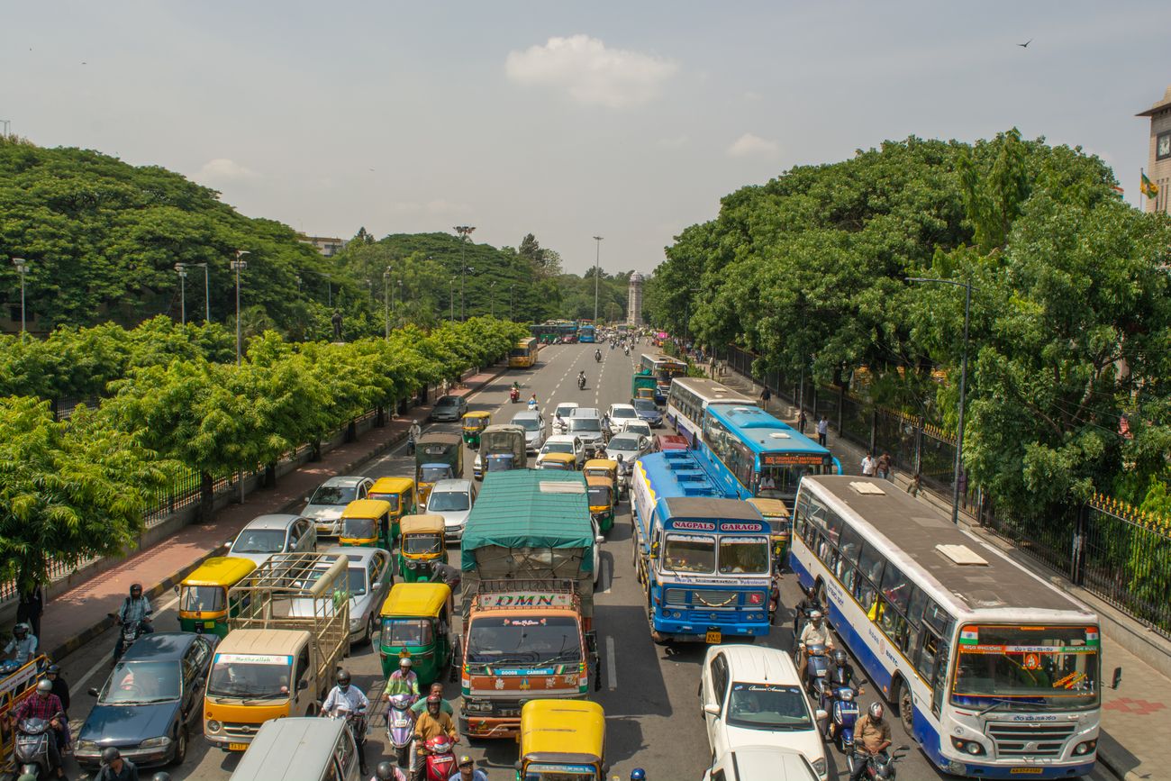 Aerial View of a five-pathway highway road with vehicles waiting in the traffic jam near BBMP Bengaluru Office, Karnataka 