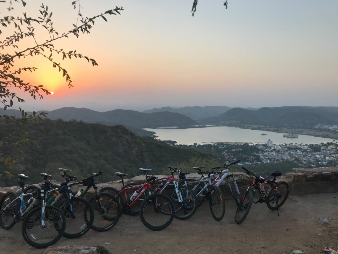 Bicycles parked outside the fort, with wonderful views of Jal Mahal and the lake in the background