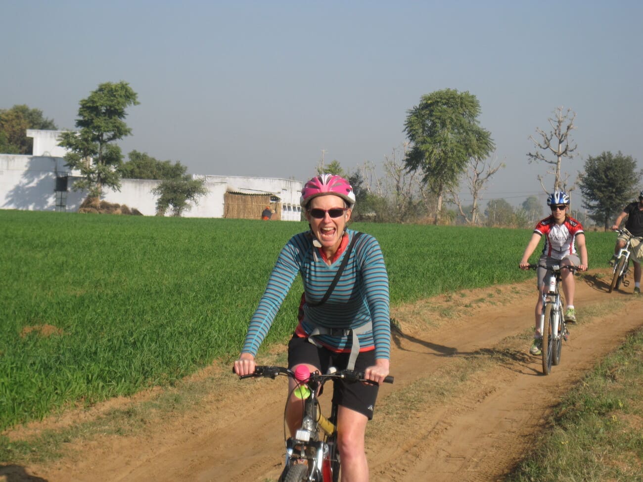 Cycling through the green field of the farms