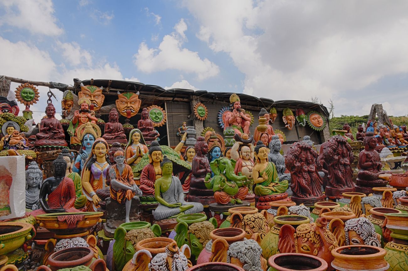 Different varieties of HDR pottery pots and idols of God showcased from the street market of Bangalore