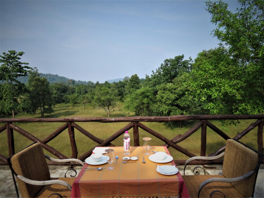 Dinner with a view of the beautiful landscape at the luxurious Taj Mahua Kothi Hotel in Bandhavgarh Tiger Reserve