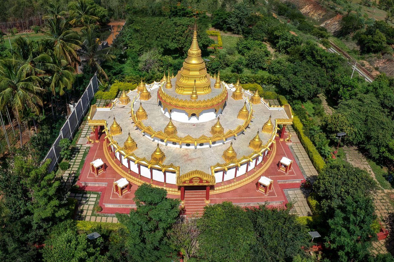 A beautiful aerial drone picture of the Bodhi Rasmi Pagoda, inside the Mahabodhi Dhammaduta Vihara Buddhist monastery situated in Bangalore, Karnataka