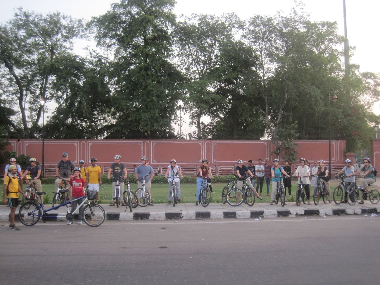 Guests gather for an introduction in the early morning before they start their cycle trip through the city of Jaipur