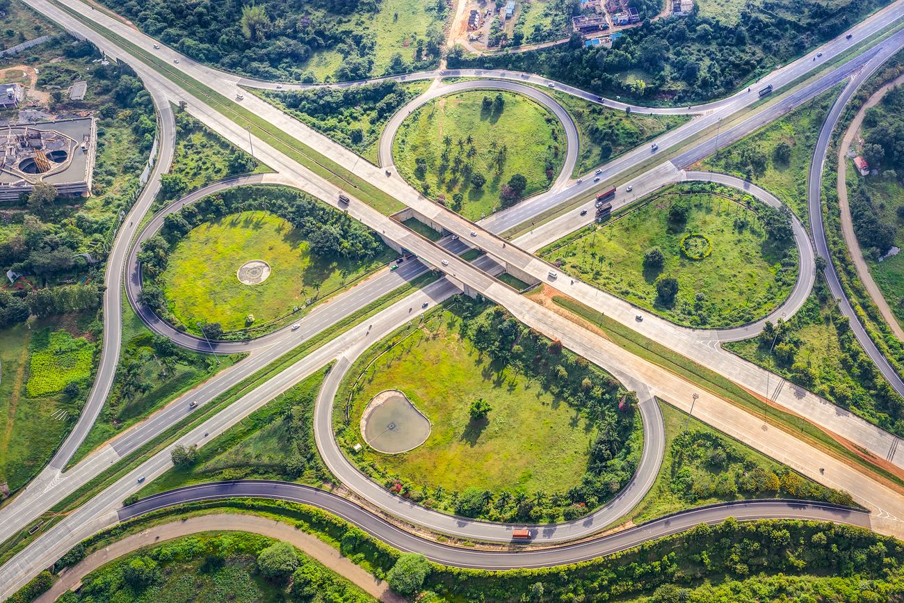 A mesmerizing aerial view of the CloverLeaf Junction on NICE Road. It is a four to six lane private tolled expressway connecting the two cities of Bangalore and Mysore