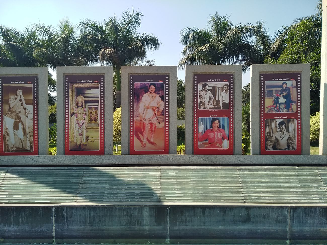 Superhit veteran actor Dr. Raj Kumar’s movie posters in a frame put up at his burial land for a memory 