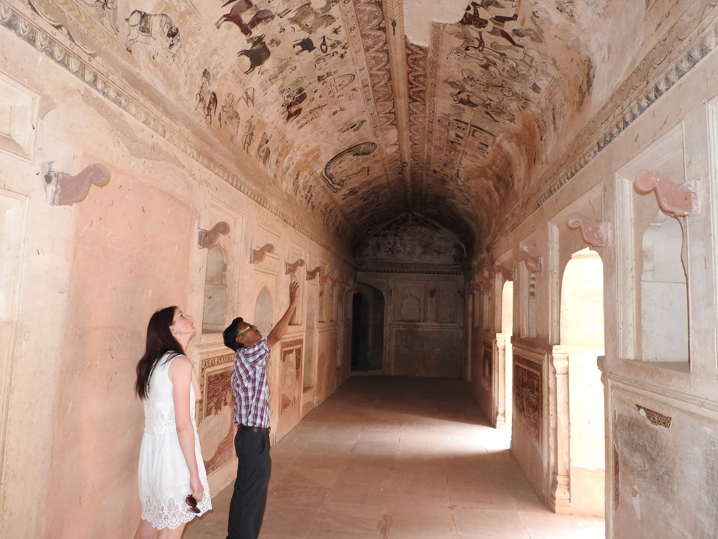 The curved ceiling inside Lakshmi Narayan temple, lined with murals dedicated to Goddess Laxmi, located in Orchha 